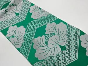 菱に七宝・抽象花葉模様織出し丸帯